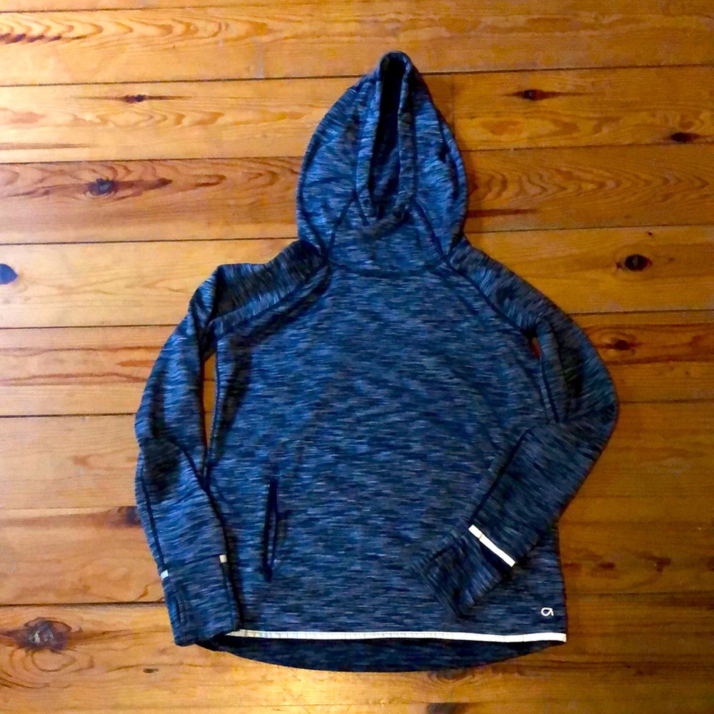 Grey warm-up top.